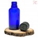 Blue glass bottle with childproof cap, 30 ml